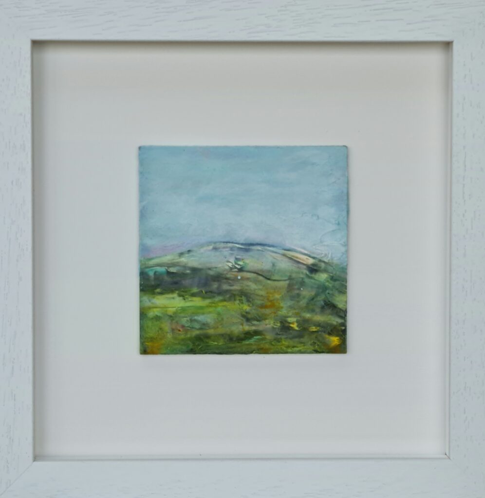Photo of British artist Hilary Barry's framed landscape painting "Here and There" (oil on board, 37 x 37 cm)