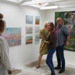 Photograph of visitors to British artist Hilary Barry's studio, which she opened to the public as pert of Suffolk Open Studios 2017.